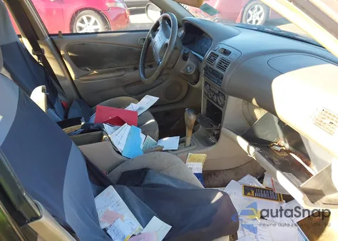 2001 Toyota Corolla Le from USA, damaged, VIN 2T1BR12EX1C504513